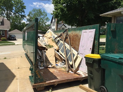 Get a rental dumpster with a gate for easy access